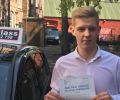 Nick with Driving test pass certificate